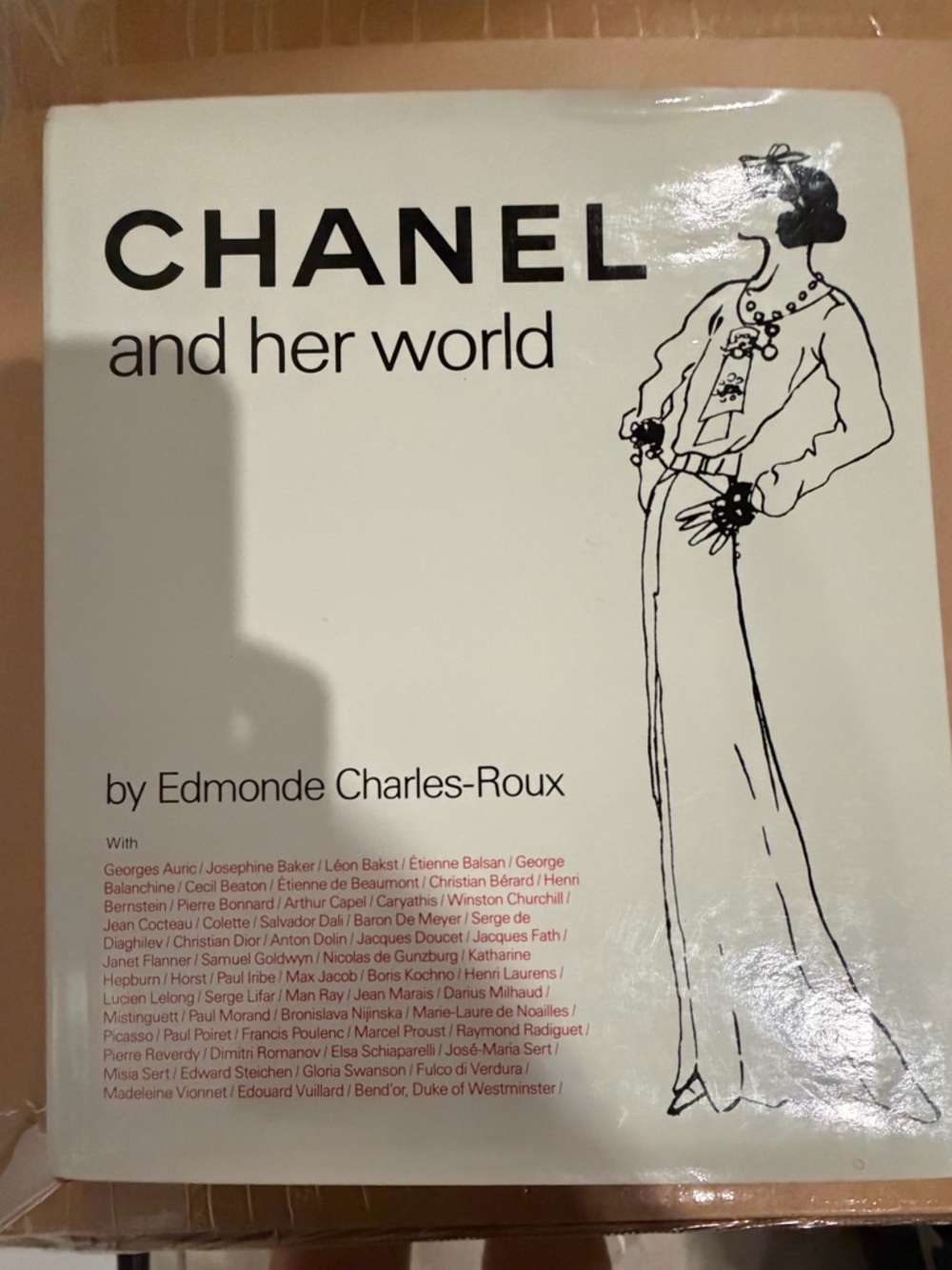 CHANEL Black and White Illustrated Hardcover - 'and her world'